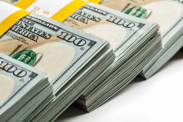 Da A A Background Of New Us Dollars Banknotes Bills Ek Vtmb Scaled